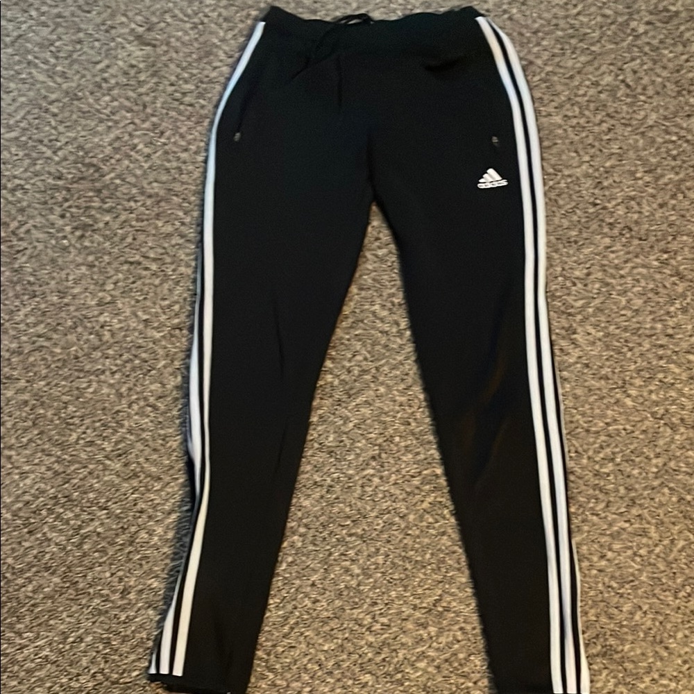 Adidas Black and White Jumpsuit with Iconic Stripes